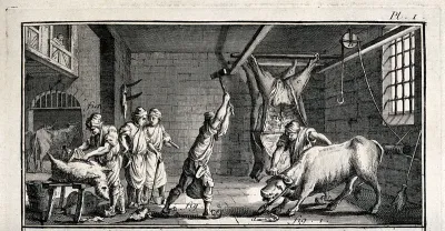 An abattoir: animals are being killed and the carcasses hung up from beams
