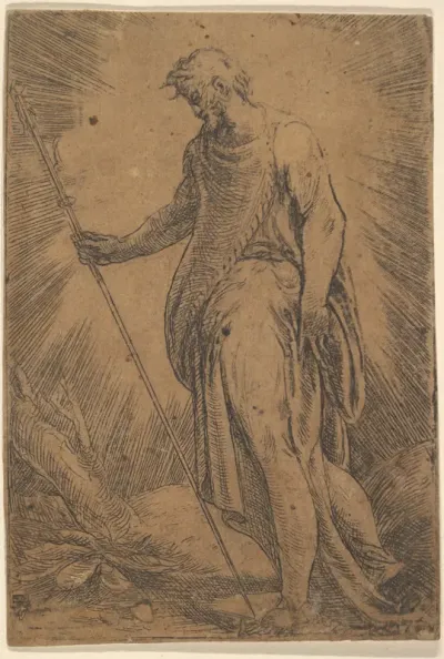 An apostle holding a staff facing left