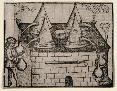 An apothecary drawing a distillate from one of four stills heated by a single oven