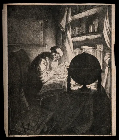 An astrologer wearing spectacles sits in his study reading by a globe