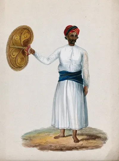 An attendant holding a fan