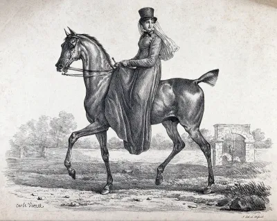 An elegantly dressed woman on horseback