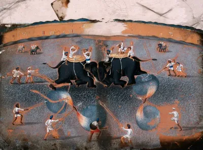 An elephant fight, with a few men holding spears with sparkling fires at one end