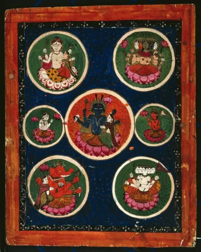 An image of Lord Vishnu and Lakshmi in the central circle surrounded by images of other deities, including Shiva and Parvati, Mahadevi and Ganesha