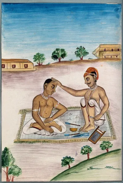 An Indian barber prepares to shave a Brahmin's head
