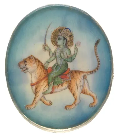 An Indian deity with four-arms, holding a sword, lotus and a mace, sitting on a tiger
