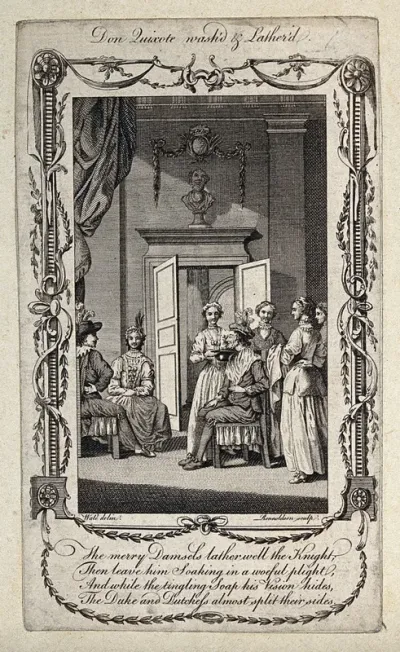 An interior of a room in which a man is having his face washed and lathered by a young woman; to the right stand three other women, to the left a seated couple look on