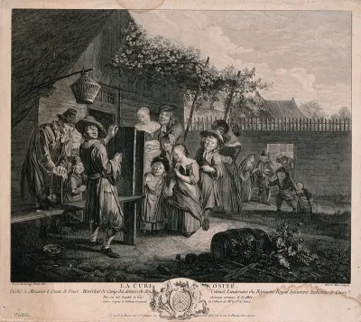 An itinerant young man is presenting a "boîte à curiosité" or magic lantern show to children and adults who are gathering around to look