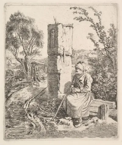 An Old Lady Sitting Near a Pillar at Side of Road