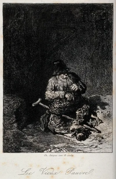 An old man sitting cross-legged on the ground next to his crutches