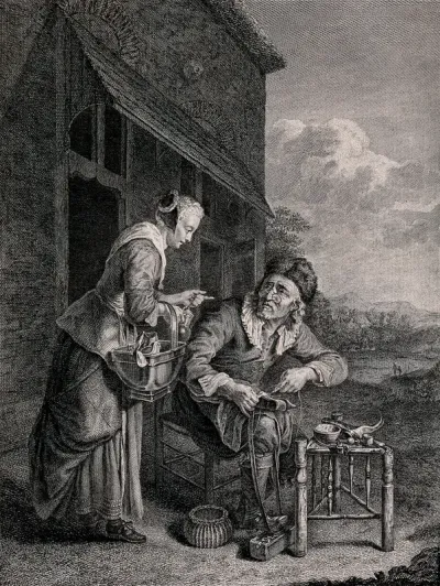 An old shoemaker is stitching a boot as a young woman leans over him holding a jug in her hand