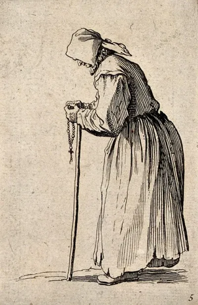 An old woman dressed in rags holding a rosary in her left hand and a staff in her right