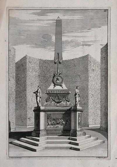 An ornate garden obelisk with a battle scene carved in relief on the base