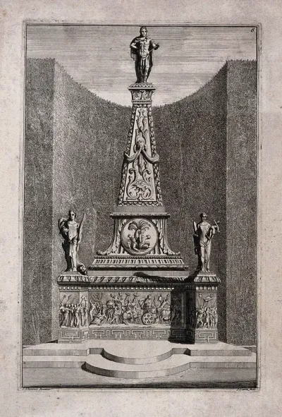 An ornate garden obelisk with a triumphal procession carved in relief on the base