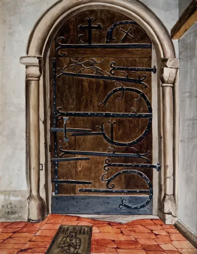 Architecture: a church doorway with wrought ironwork at Woking, Surrey