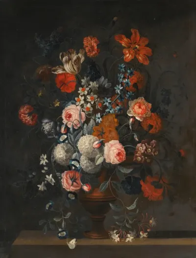 Arrangement of tulips, a peonie, forget-me-not and other flowers in a vase on a ledge