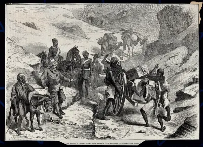 Astronomy: a British and Egyptian party taking astronomical and photographic equipment through rocky terrain in Egypt in order to observe the transit of Venus