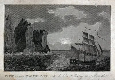 Astronomy: a sailing ship at the North Cape, Norway, sailing under the midnight sun