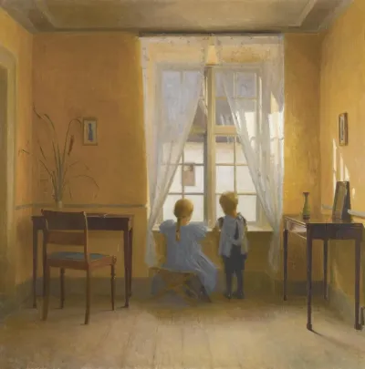 At the window.