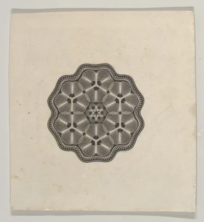 Banknote motif: a small six lobed ornament with a rope border, the interior adorned with lathe work florets