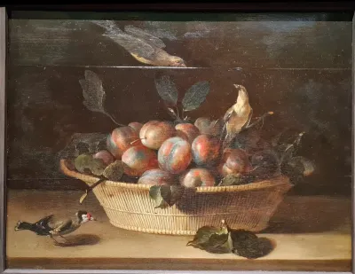 Basket of fruit with birds