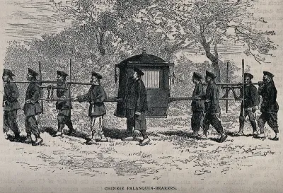 Bearers in China carrying a sedan chair suspended between poles