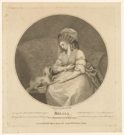 Belisa op een sofa met een kleine hond