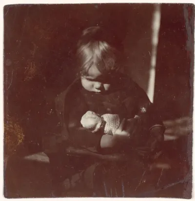 Betty Reynolds with Doll on Lap