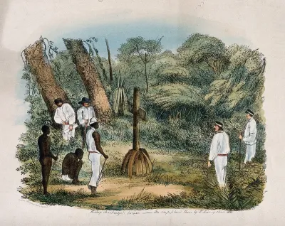Bishop Charles Mackenzie's grave with the cross placed there by David Livingstone; Europeans and Africans nearby