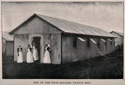 Boer War: a temporary hospital hut at Netley with four nurses at the door