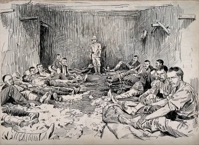 Boer War: wounded British soldiers lying in a waggon-house which is being used as a temporary hospital