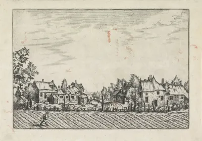 Boerderijen bij een geploegd veld