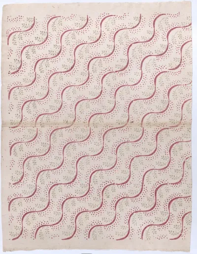 Book cover with overall red and green vine pattern