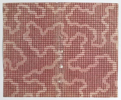 Book cover with red crisscross and stripe pattern