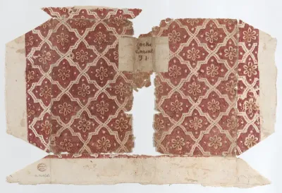 Book cover with red geometric and flower pattern