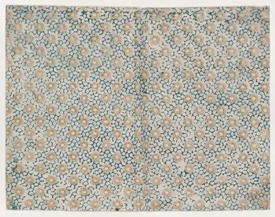 Book cover with yellow floral pattern atop blue curved lines