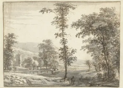 Boomrijk landschap met wandelaar op een pad
