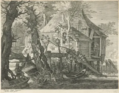 Boshut op palen bij een rivier