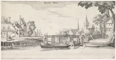 Boten bij een aanlegsteiger in een dorp