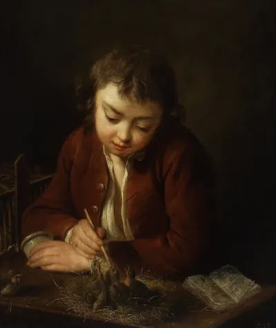 Boy feeding chicks.