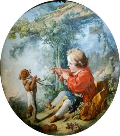 boy playing with a dog