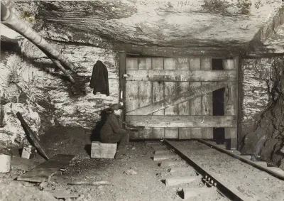 Boy Waiting for Coal to Come Thru