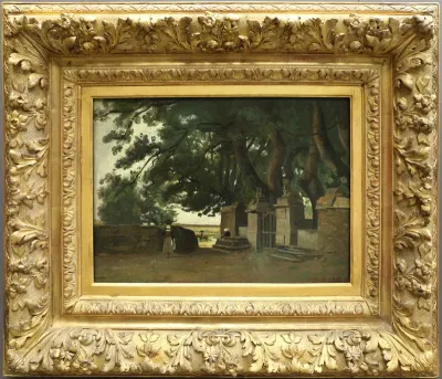 Breton landscape. A gate shaded by tall trees