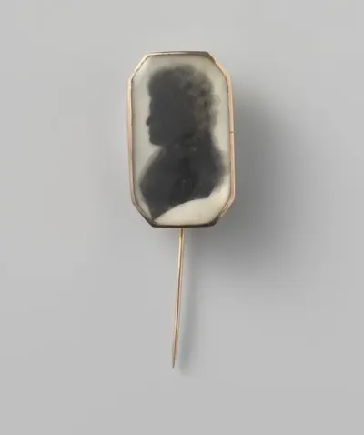 Broche met silhouetportret van een vrouw