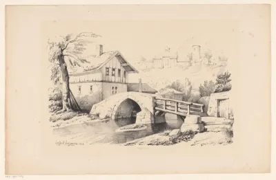 Brug en huis in heuvelachtig landschap