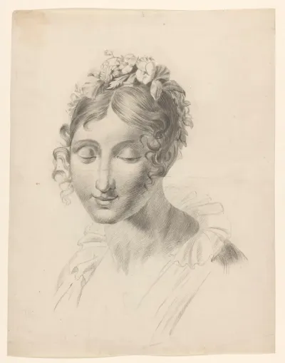 Buste van vrouw met bloemen in het haar