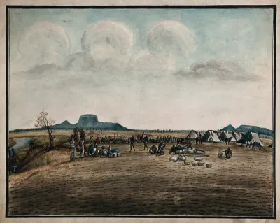 Campsite: guards on duty, horses grazing, food being prepared and people sitting around