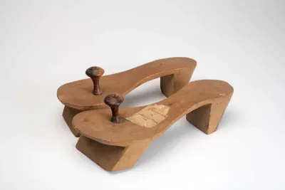 Carved sandal of wood