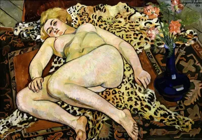 Catherine lying naked on a panther skin
