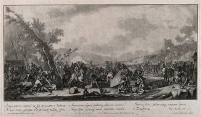 Chaos in the aftermath of battle with the dead and wounded being attended to as the armies retreat
